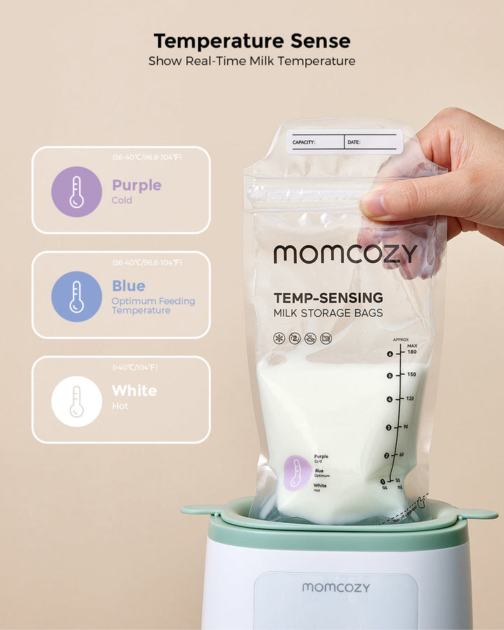 Hand placing Momcozy Temp-Sensing Milk Storage Bag filled with milk into bottle warmer showing real-time milk temperature with indicators for cold, feeding temperature, and hot.