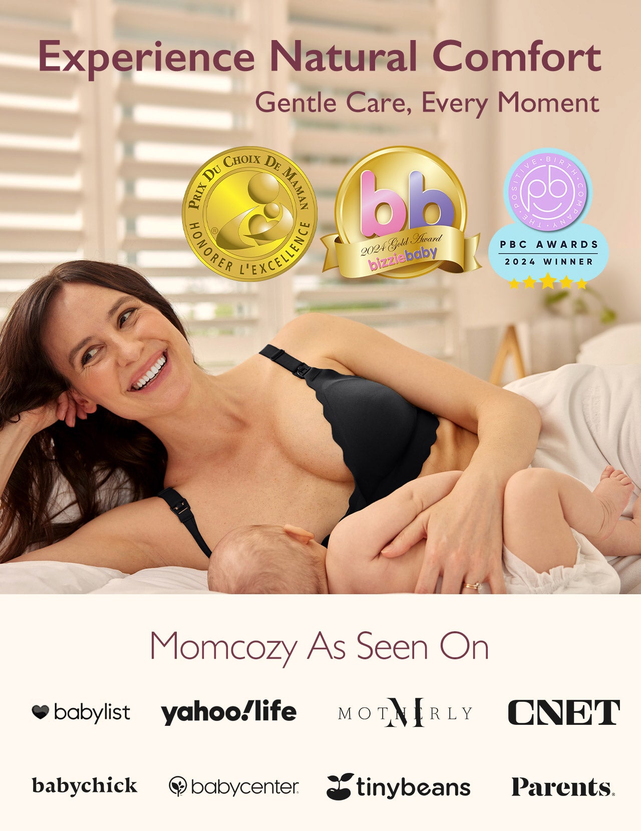 Smiling mom in comfortable black YN46 nursing bra breastfeeds baby. Momcozy M9 Bra Bundle, awarded for natural comfort.