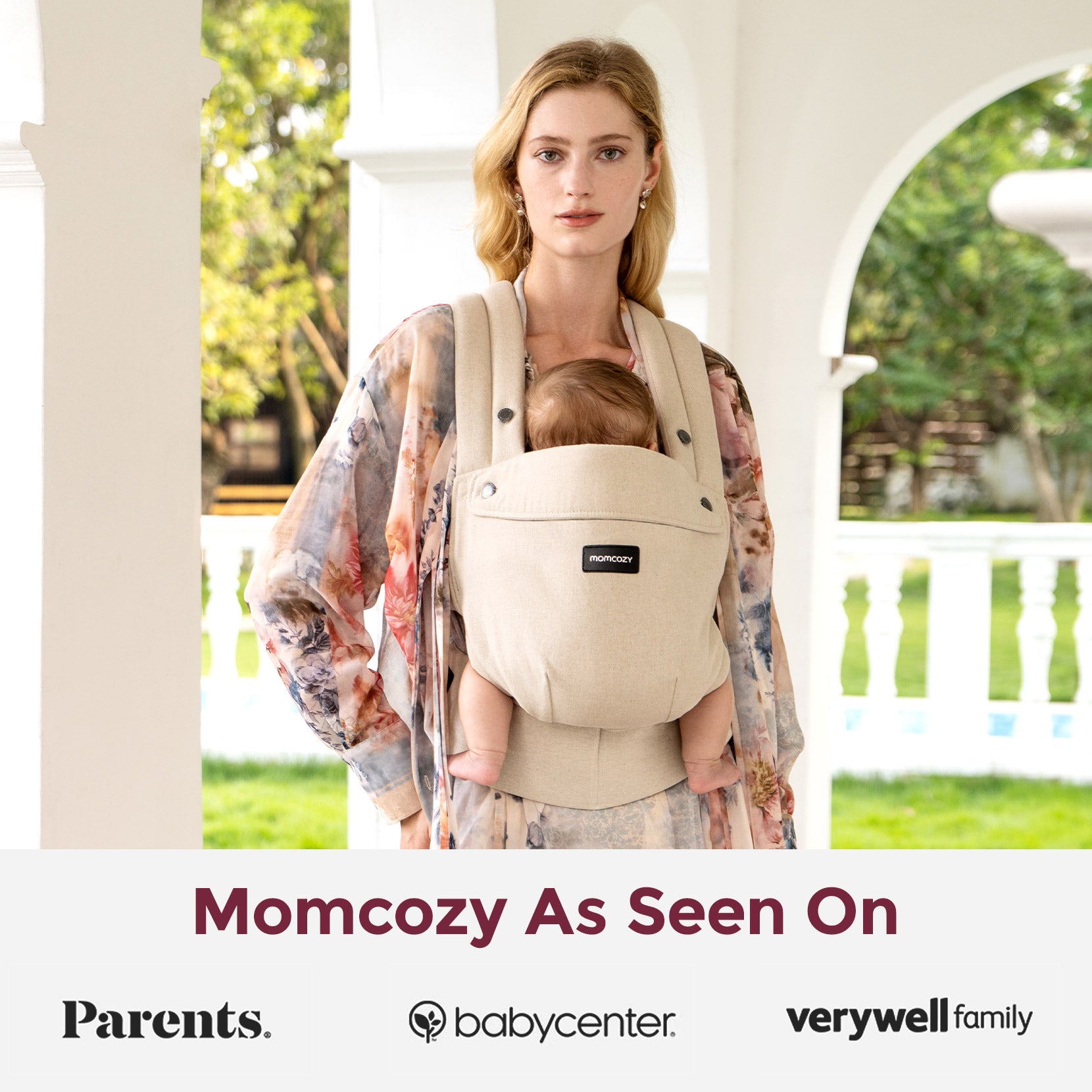 Momcozy PureHug beige baby carrier, mother babywearing. Featured in Parents, BabyCenter, Verywell Family. Stylish support.