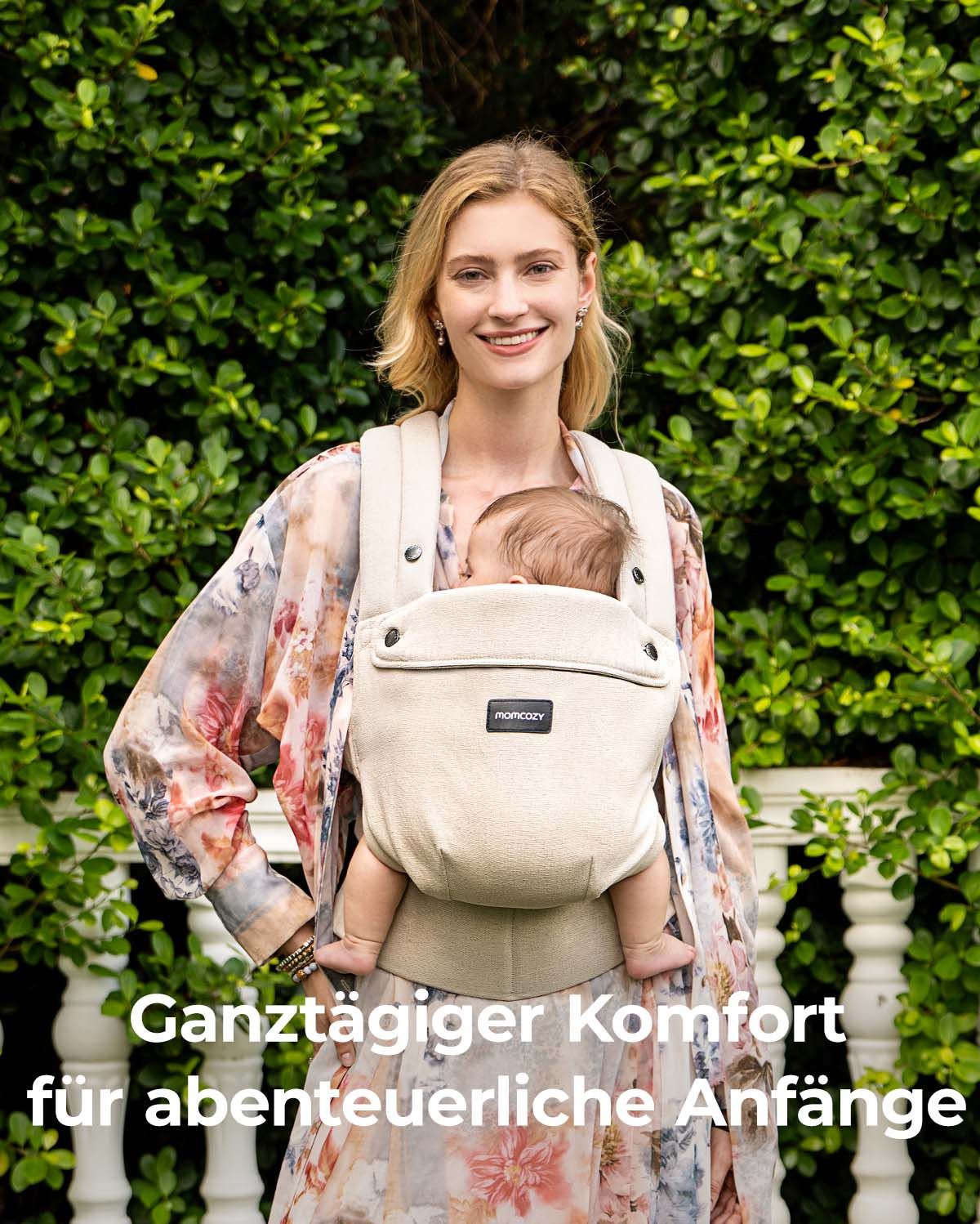 Momcozy PureHug beige baby carrier. Mother babywearing newborn for all-day comfort and adventurous beginnings.