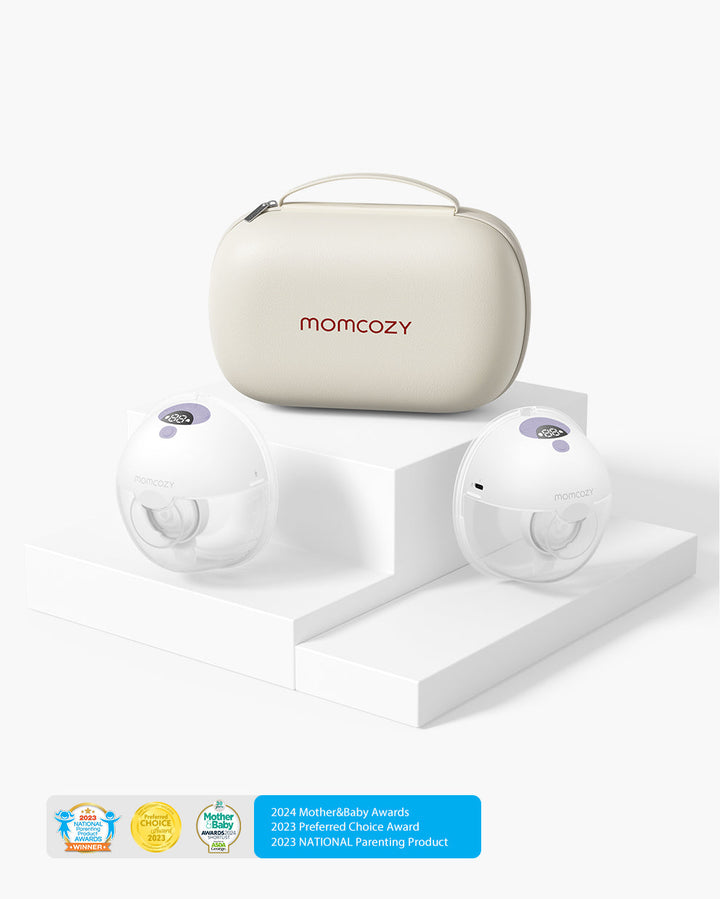 Momcozy All-in-one M5 Wearable Breast Pump with storage case on white platform, showcasing awards.