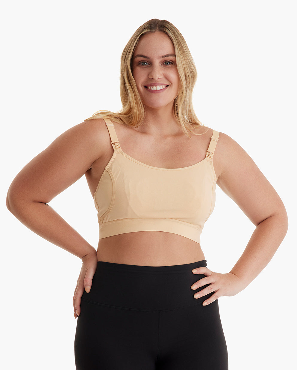 Smiling blonde in beige YN08 pumping & nursing bra, featuring adjustable straps and seamless design.