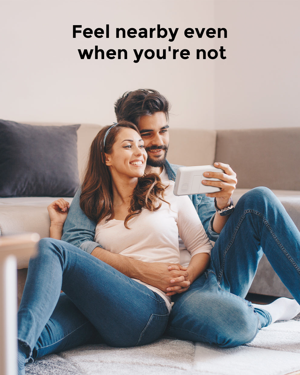 Couple using Momcozy 1080P Video Baby Monitor, view baby anytime, anywhere, feel nearby even when you're not