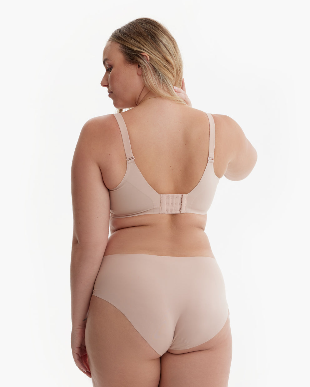 Light peach YN21 Ultra Soft Seamless Nursing Bra, rear. Wide adjustable straps, secure multi-hook back for M5 pump.