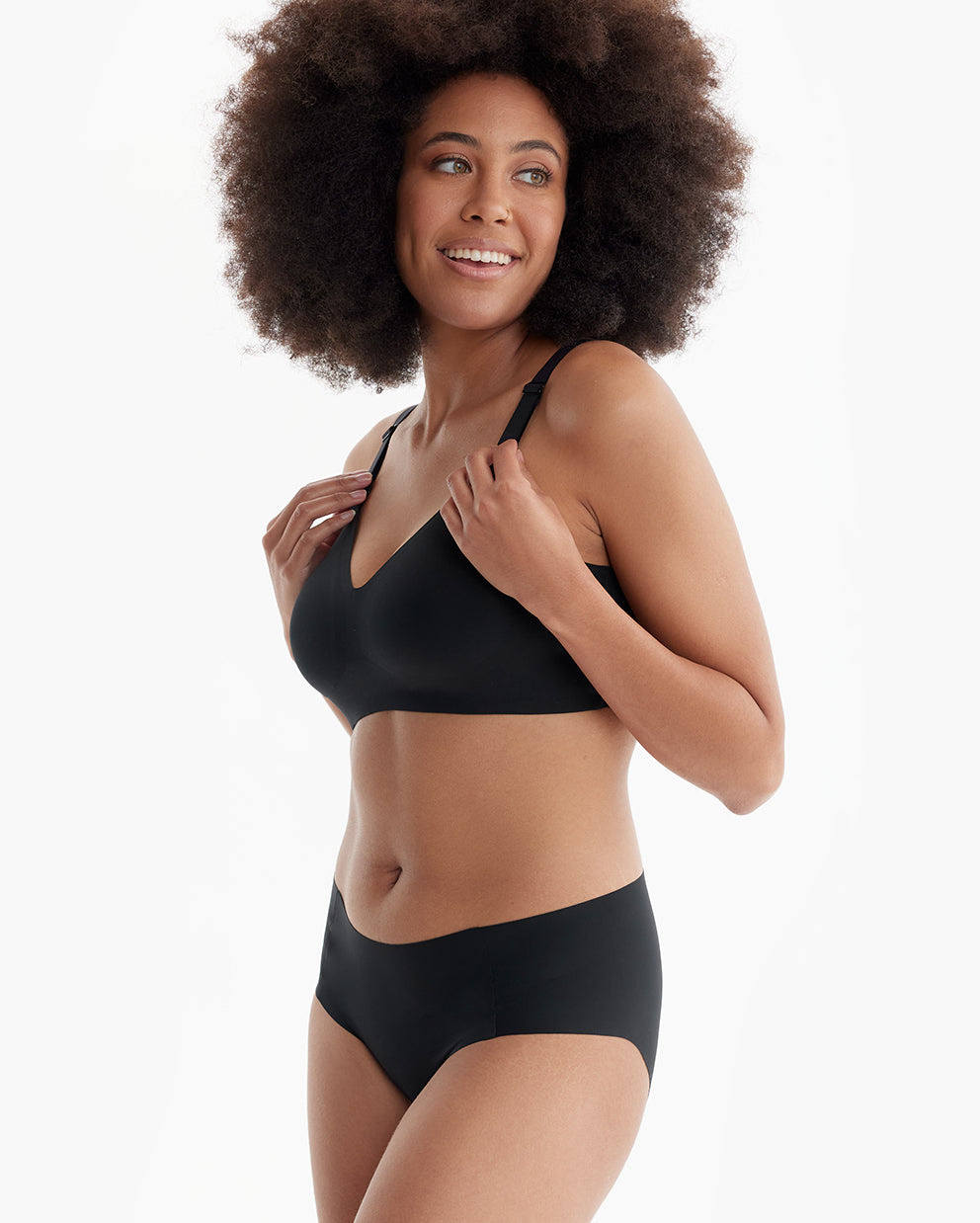 Model in black YN21 Ultra Soft Seamless Nursing Bra, showcasing its comfortable, seamless design and M5 pump compatibility.